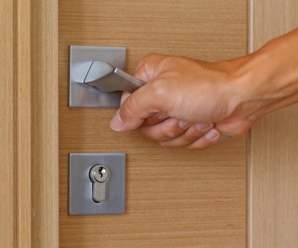 Man open room door at home